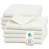 A stack of white muslin cloths with a tag attached. Produktbild-Vorschau