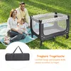 A family is having a picnic in a park with a playpen. Náhľad obrázku produktu