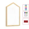 A house-shaped whiteboard with a wooden frame, shown with accessories like magnets and markers. Podgląd zdjęcia produktu