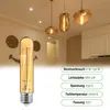A vintage-style LED light bulb is shown in the foreground, with three pendant lights in the background. Technical specifications for the bulb are displayed in a green overlay on the right side of the image. Produktbild-Vorschau