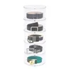 A clear, studio shot of a cylindrical acrylic organizer holding five belts, each on its own clear shelf. Podgląd zdjęcia produktu