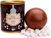 A chocolate ball with marshmallows next to a tin can. Produktbild-Vorschau