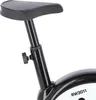 Close-up of the seat post and saddle of a stationary bicycle. Produktbild-Vorschau