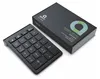 A black numeric keypad and its packaging are displayed on a white background. Náhled obrázku produktu