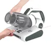 A person is holding a part of a vacuum cleaner while another person's hand is pressing a button on the base. Produktbild-Vorschau