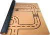 A rolled-up play mat with a road pattern is shown on a white background. Produktbild-Vorschau