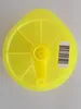 Top view of a yellow Tassimo cleaning disc. Produktbild-Vorschau