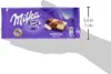 A hand is holding a Milka chocolate bar. Náhled obrázku produktu