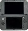 A front-facing view of a closed Nintendo 3DS XL console. Náhled obrázku produktu