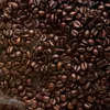 A close-up view of roasted coffee beans. Produktbild-Vorschau
