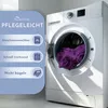 A washing machine with a purple towel inside, next to a blue panel with product care information. Produktbild-Vorschau