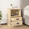 A wooden nightstand with two drawers next to a bed. Voir les images du produit