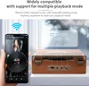 A hand holding a smartphone displaying music playback, next to a retro-style music player. Produktbild-Vorschau