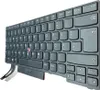 A close-up, angled view of a black laptop keyboard with German key labels, set against a white background. Produktbild-Vorschau