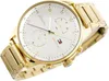 A close-up shot of a gold Tommy Hilfiger watch with a white face. Produktbild-Vorschau