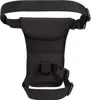 A black side kick bag with a belt and leg strap, shown against a white background. Produktbild-Vorschau