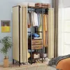 A bedroom scene with a large open wardrobe, clothing, and accessories. Produktbild-Vorschau