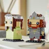 Two LEGO BrickHeadz figures, Aragorn and Arwen, are displayed on a white surface with a blurred background. Produktbild-Vorschau