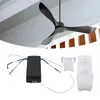 A ceiling fan is shown from below, with its components laid out on a white surface. Podgląd zdjęcia produktu
