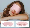 A woman wearing a pink sleep mask rests her head on her arm. Anteprima dell’immagine prodotto