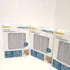 Three boxes of window pollen protection are lined up on a white surface against a white background. Anteprima dell’immagine prodotto