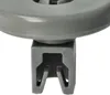 A close-up of a gray plastic dishwasher basket roller wheel with its attachment clip. Produktbild-Vorschau