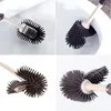 Collage of four images showing a silicone toilet brush from different angles, some in use in a toilet bowl. Anteprima dell’immagine prodotto