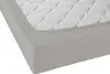A close-up view of a mattress protector on a mattress. Produktbild-Vorschau