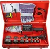 A red metal case containing a PVC pipe welding machine and its accessories, laid out for display. Náhľad obrázku produktu