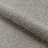 A close-up view of a textured gray fabric, likely upholstery or carpet. Náhled obrázku produktu