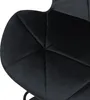 A close-up view of a black upholstered seat with diamond-shaped stitching. Produktbild-Vorschau