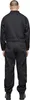 A person wearing a black jumpsuit, viewed from the back. Náhled obrázku produktu