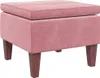 A pink velvet ottoman with wooden legs is shown against a white background. Náhľad obrázku produktu