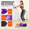 A woman is using a balance ball trainer with resistance bands in a room. Produktbild-Vorschau
