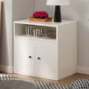 A white cabinet with two doors and an open shelf, decorated with cups and a plant. Produktbild-Vorschau