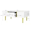 A white coffee table with gold legs and accents, shown with dimensions indicated. Produktbild-Vorschau