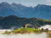 CALVENDO Puzzle Kirche St. Thomas vor Bergen, umgeben von Produktbild-Vorschau 3