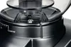 Close-up of the top part of a coffee grinder, focusing on the grind setting adjustment. Podgląd zdjęcia produktu