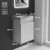 A white vanity with a sink and faucet is shown against a dark gray wall, with dimensions indicated by white lines and text. Produktbild-Vorschau