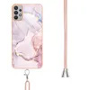 A phone case with a marble pattern and a lanyard. Náhled obrázku produktu