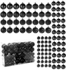 A collection of black Christmas ornaments in various styles and a clear plastic box filled with more ornaments. Podgląd zdjęcia produktu