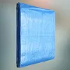A folded blue tarp is shown against a gradient background. Produktbild-Vorschau