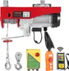 A product shot of an electric hoist and its accessories, including remote controls. Náhľad obrázku produktu