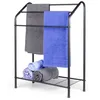 A black metal towel rack with several towels on it, against a white background. Anteprima dell’immagine prodotto