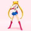 A Sailor Moon action figure against a light pink background. Produktbild-Vorschau