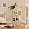 A living room scene with a cat tree and cats. Podgląd zdjęcia produktu