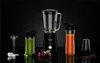 A black blender set with various accessories and ingredients displayed on a reflective black surface against a black background. Podgląd zdjęcia produktu