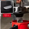 A person is holding a wet/dry vacuum cleaner over a red bucket, with a close-up inset showing a button labeled 'PRESS'. Náhľad obrázku produktu