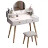 A white vanity table with a round mirror and a stool, set against a white background. Podgląd zdjęcia produktu
