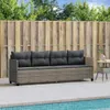 An outdoor patio scene with a sofa and a small table next to a swimming pool. Produktbild-Vorschau